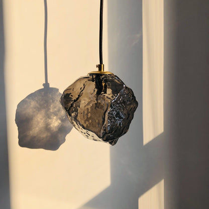 Glaspendel i lava-design